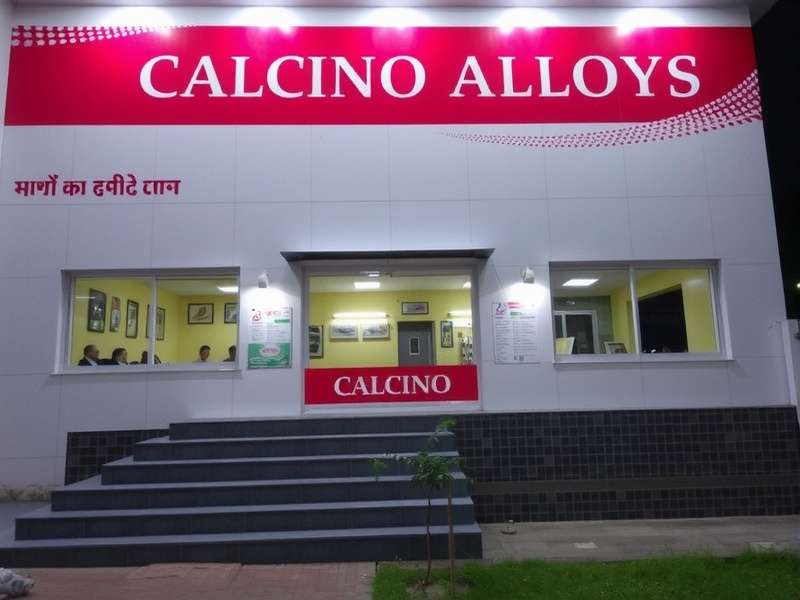 Quality control technician using a spectrometer